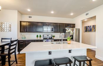 Kitchen with Kitchen Island and Stainless Steel Appliances